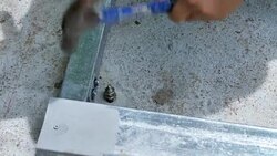 Young man working with hammer. Installation Lower base of prefabricated houses. video Slow Motion Stock Footage