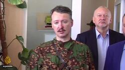 MH17 trial starts with four accused facing murder charges News Clip