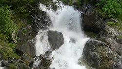 View waterfall scenes in mountains, national park Dombai, Caucasus, Russia Stock Footage