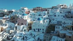 Santorini from Above: Drone Unveils Blue Domes and Sunset Skies Stock Footage