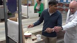 Rishi Sunak decorates a plate on General Election campaign trail News Clip