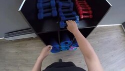 Gym woman strength training taking dumbbell weights from shelter getting ready for exercise workout. Female fitness girl exercising indoor in fitness center. pov, point of view, sport lifestyle concept Stock Footage