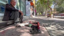 CLEAN : Afghanistan: Defaced images of women on salon frontage in Kabul News Clip