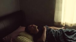He wakes up in the morning, dark room silhouette light of the window. Stock Footage