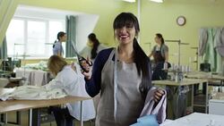 Portrait of Cheerful Seamstress at Work Stock Footage