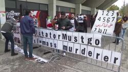 CLEAN : Demonstration on sidelines of a football match to support victims of Iranian regime News Clip