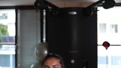 Young and strong woman exercising with a kettlebell Stock Footage