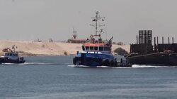 Boats moving through Suez Canal News Clip