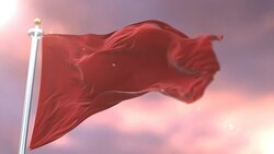 Red flag waving at wind in slow at sunset, loop Stock Footage