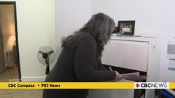 What is 211 P.E.I., and how does it connect callers to the help they need? News Clip