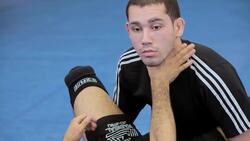 How to Do a Copacabana Choke from a Triangle Attack Instructional Video