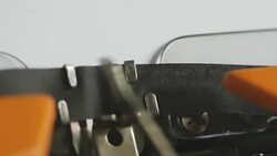 Close up shot of a person writing DISCRIMINATION on an old typewriter, with sound Stock Footage