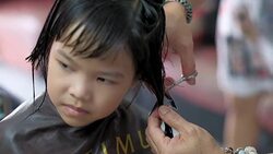 Haircut little girl Stock Footage