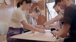 Creative designers enjoying art and craft project, assembling string art in office Stock Footage