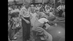 Tony the chimpanzee enjoys amusement park rides with boy and girl at Palisades Park in New Jersey News Clip