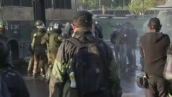 CLEAN : Chile protesters dispersed with water cannons as outcry continues News Clip