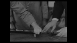 In factory in England, experts examine weapons and ammunition made in Russia and Czechoslovakia and captured in Egypt, 1956 News Clip