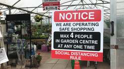 Social distancing signs inside a reopened Irish garden centre News Clip