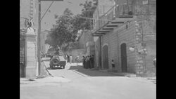 Street scenes in Nazareth including soldiers, tanks, and both Catholic and Greek Orthodox Churches of the Annunciation News Clip