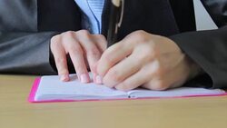 Left handed person writing Stock Footage