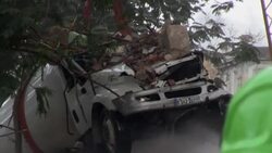 CLEAN : Fire brigade removes gas cylinder impeding rescue operations at site of hotel blast News Clip