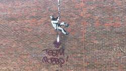 Banksy on the side of Reading prison defaced News Clip