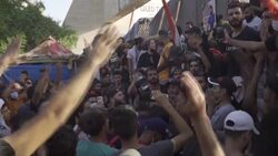 CLEAN : Thousands of Iraqis mark the first anniversary of the anti-government protest movement News Clip