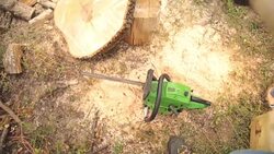 Lumberjack fixing / maintain the chainsaw outdoors. Stock Footage