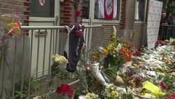 CLEAN : People lay flowers at site where Dutch crime reporter was shot News Clip