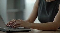 Manager typing on laptop, feeling wrist pain, joint inflammation, osteoarthritis Stock Footage