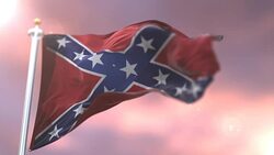 Confederate flag waving at wind at sunset, loop Stock Footage