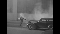 Strike sympathizers attack a General Motors plant in Flint, MI, during auto workers' strike News Clip