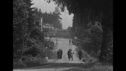 U.S.A.F. Lt. Roland crosses the German-Czech border after being released by Czechoslovakia and reunites with his wife and daughter News Clip