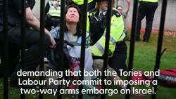 Pro-Palestine protesters spray red paint over Ministry of Defence building News Clip