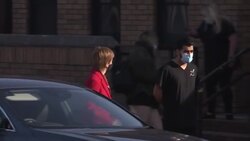 Nicola Sturgeon walking from dental surgery whilst campaigning News Clip