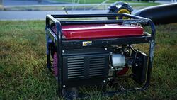 A backup generator sitting on the ground Stock Footage