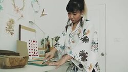 Woman artist is cutting paper Stock Footage