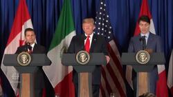 'Battle' over as Trudeau, Trump, Pena Nieto sign 'new NAFTA' News Clip