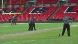 Grounds people at Wembley Stadium ahead of NFL match News Clip