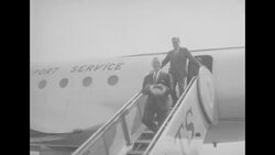 Walter Robertson, US Assistant Secretary of State, arrives at DC airport and is greeted by Secretary of State John Foster Dulles News Clip