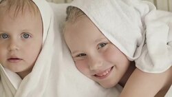 Close-up happy little children after a shower. Stock Footage