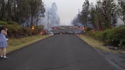Residents watch as lava engulfs road after Kilauea volcano eruption News Clip
