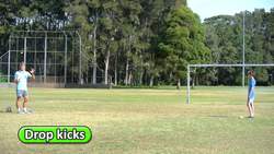 Skill: Drop kicks › In pairs | Soccer skills in PE (grade K-6) Instructional Video