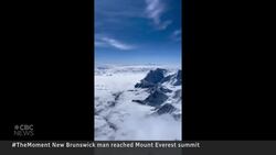 #TheMoment this mountaineer flew the New Brunswick flag from the top of Everest News Clip