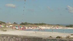 CLEAN : Lovers of Tuscany's paradise beach have factory to thank News Clip