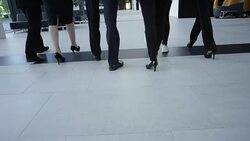 Business people walking in hall Stock Footage