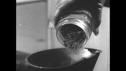 Radiation dust inhalation pharmacology experiment at UCLA's Atomic Energy Project News Clip