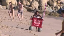 Holiday makers enjoy the sun at Atlanterra Beach News Clip