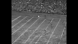 US Naval Academy beats US Military Academy in 1934 football game in mud in Philadelphia News Clip