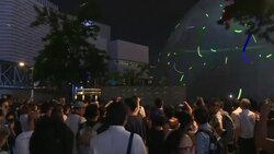 CLEAN : Hong Kong crowds protest student arrest with laser light show News Clip